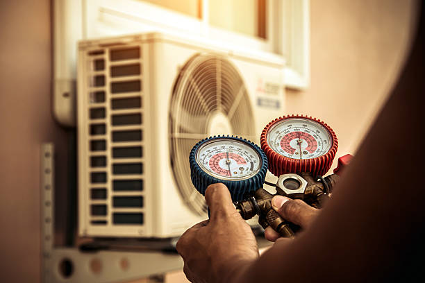 Professional Hvac technician working in Millen, GA